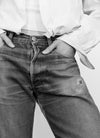 Woman wearing shirt and denim jeans