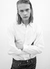 Man wearing shirt and denim jeans
