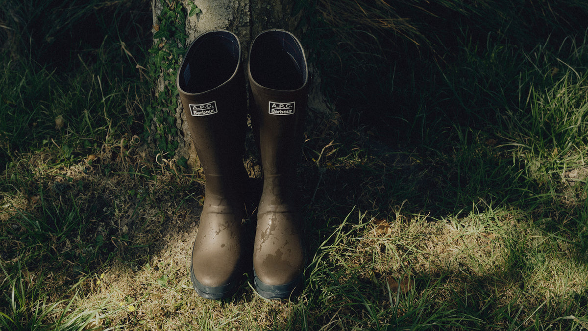 A.P.C. x Barbour - wellington boots in a field
