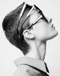 A.P.C. Eyewear - Woman wearing 3 pairs of sunglasses