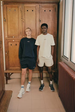 A.P.C. Asics - male models standing against lockers