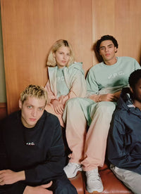 A.P.C. Asics - models lounging around a locker room