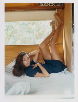 female model on a bed
