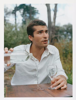 male model poring water