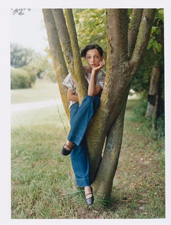 female model on a tree