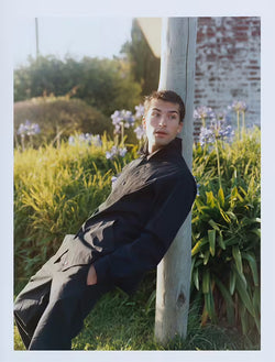 male model by a pillar