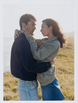 two models holding each other