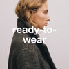A.P.C. Ready-to-Wear Care Guide - Woman wearing wool checked coat.